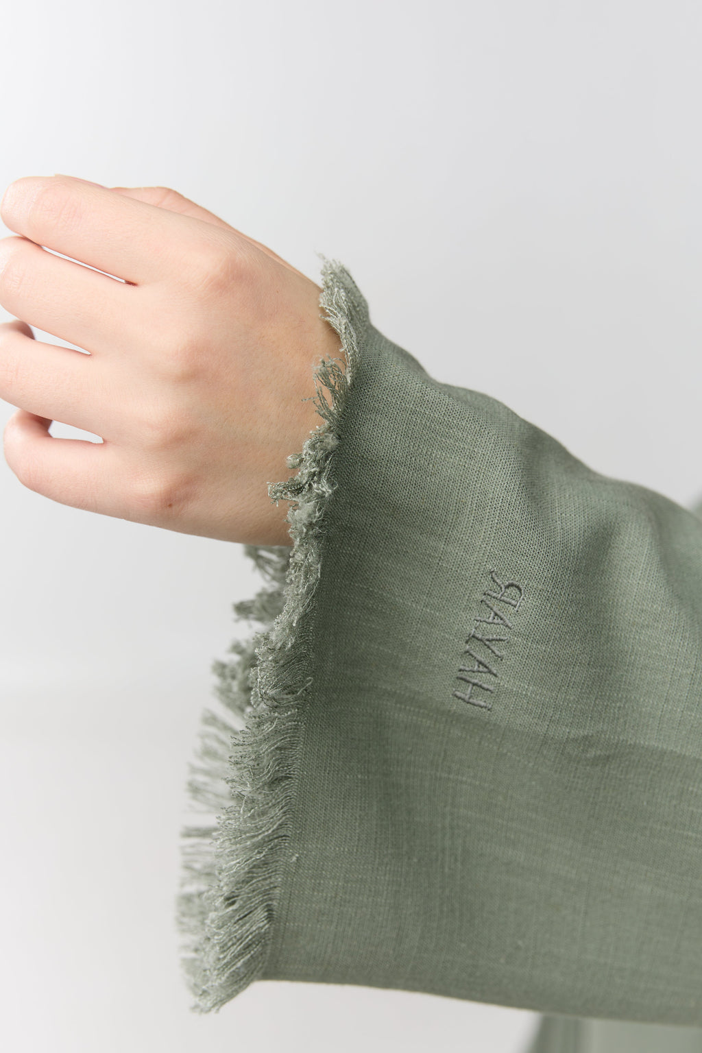 HAYAR Sage linen cuff with frayed edge and embroidery