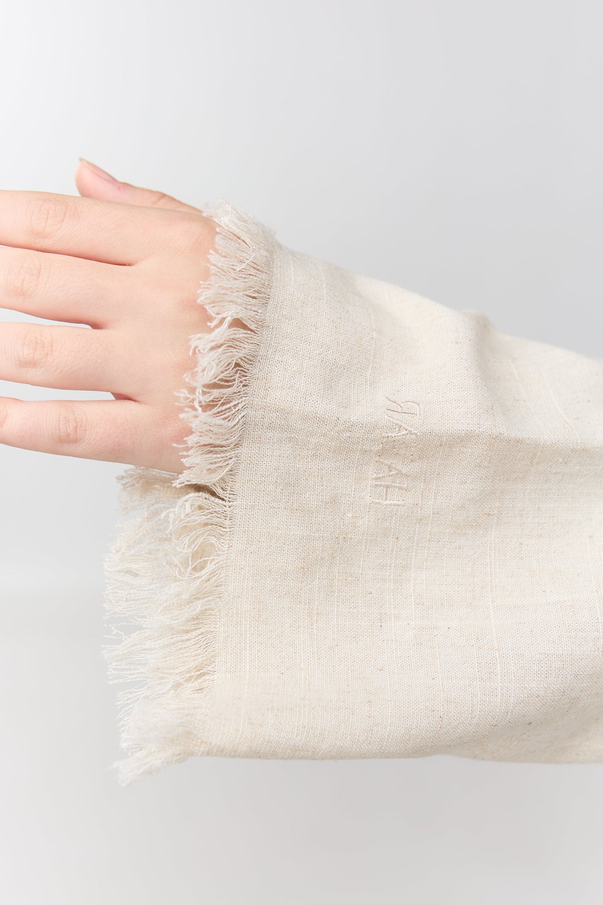 HAYAR Beige linen cuff with frayed edge and embroidery